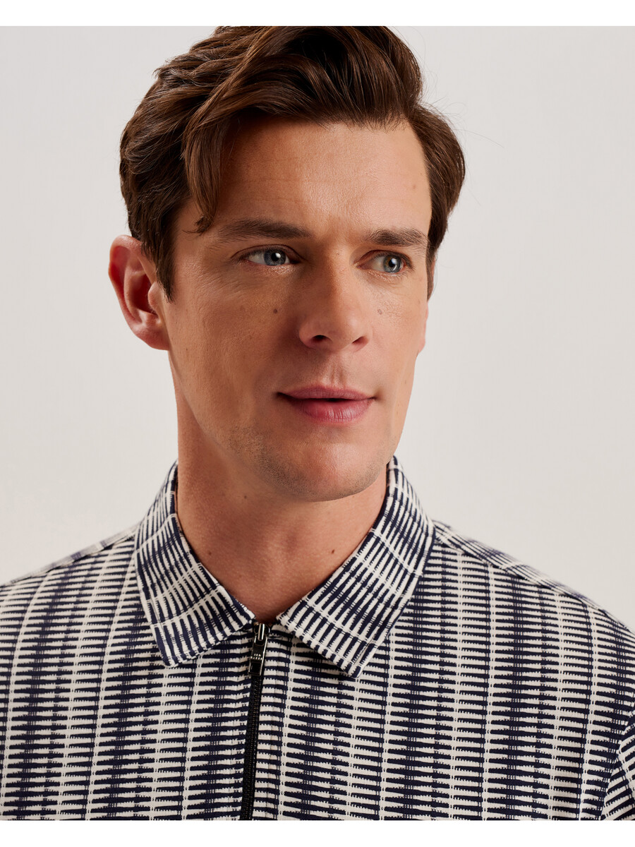 capuzzo - polo de manga larga con cremallera y rayas geométricas