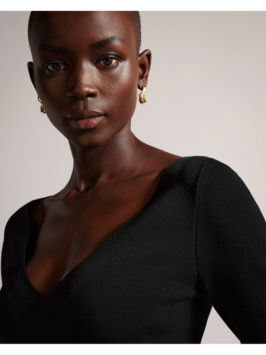 cileste - top de punto ajustado con cuello en v y manga larga